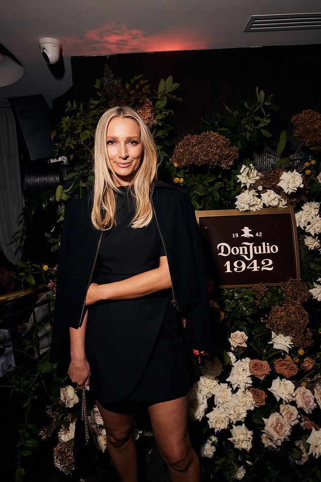 Anna Heinrich was also in attendance, looking elegant in a black mini dress with a black bolero-style jacket over her shoulders. The Bachelor star, 37, wore her blonde locks and went for a natural makeup look with a nude lipstick. Pictured