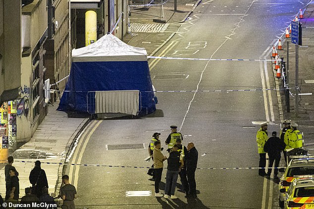 Police set up a forensic tent at the scene, which was taped off last night