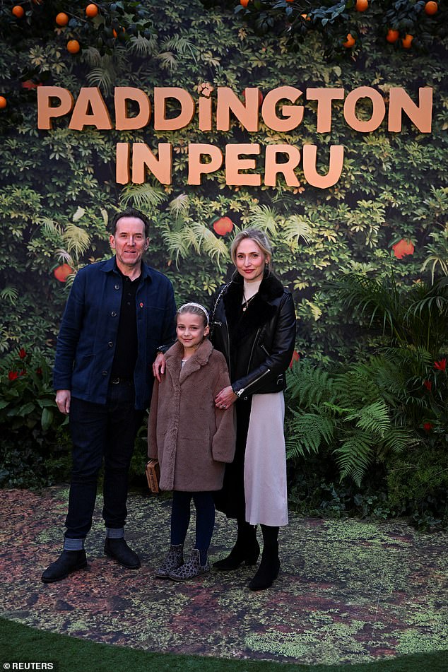 Cast member Ben Miller and Jessica Parker pose at the premiere