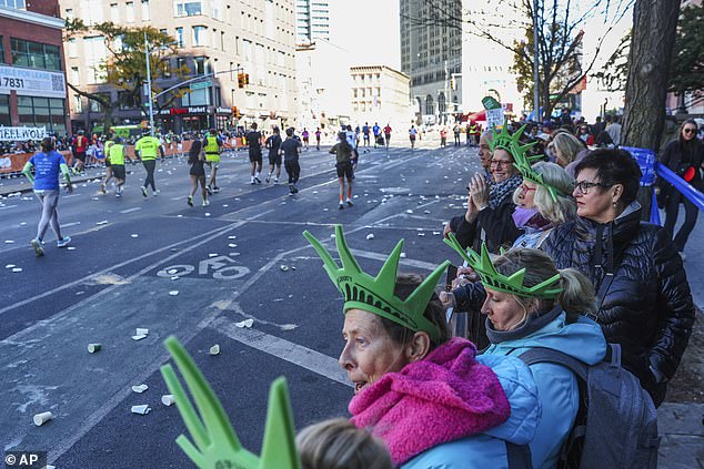 New Yorkers lined the streets to cheer on the amateurs and professionals during Sunday's race