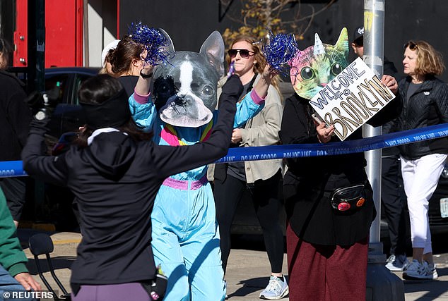 Spectators welcome the runners to Brooklyn - they pass through all five New York boroughs