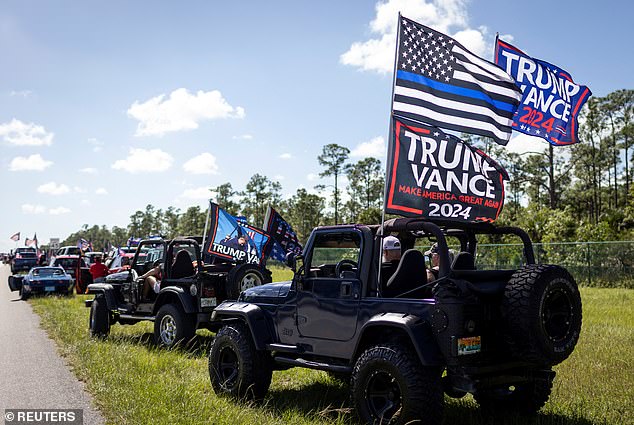 Supporters of the Republican presidential candidate and Trump attend a parade in West Palm Beach, Florida, with 48 hours until Election Day