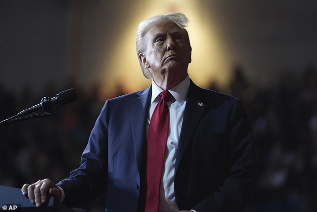 Republican presidential candidate, former President Donald Trump, looks at a video screen during a campaign rally at the Salem Civic Center, Saturday, November 2, 2024, in Salem, Virginia