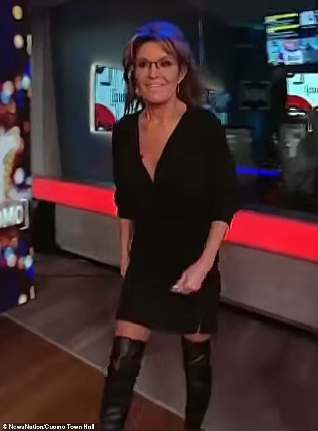 but some seemed more interested in the former vice presidential candidate's dress than what she said, thinking it was too risqué for such an appearance. The dress featured a dangling neckline and was accessorized with some knee-high leather boots