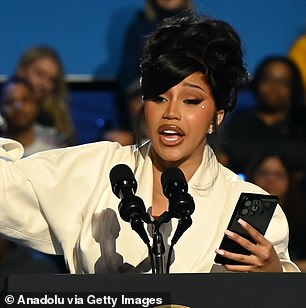 A problem with the teleprompter resulted in the singer reading her speech from a cell phone (pictured in Milwaukee, WI on November 1)