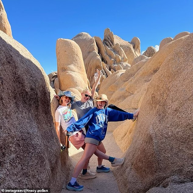 More photos from the same trip showed Esmé representing her alma mater in a blue Duke sweatshirt as she hiked through a formation of picturesque rocks and boulders with her mother and one of her sisters