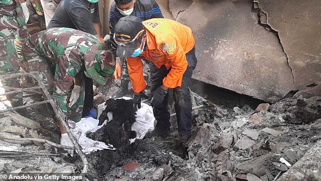 Search and rescue teams conduct an operation after a volcanic eruption occurred on Mount Lewotobi Laki Laki in Flores Islands, Indonesia on November 4, 2024