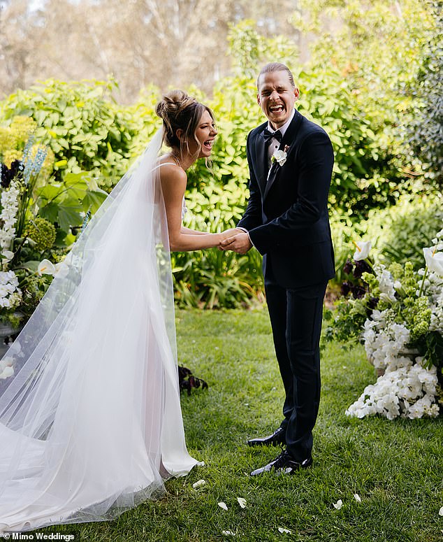 The genetically blessed couple enjoyed laughing in the picturesque setting