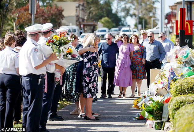 Crown prosecutor Ken McKay SC said Mr Tougher was unable to escape Fineanganofo because he was trapped between the back of the ambulance and his attacker (pictured, Mr Tougher's funeral)