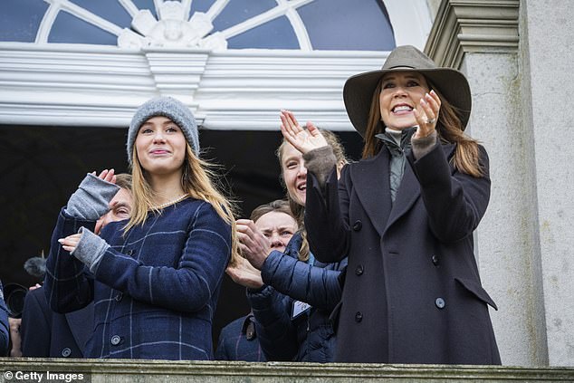 Queen Mary reacts as the crowd cheers at the annual event today