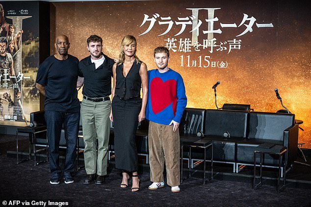 The cast of Gladiator II posed for a photo (L-R Denzel Washington, Paul Danish actress Connie Nielsen and American actor Fred Hechinger)