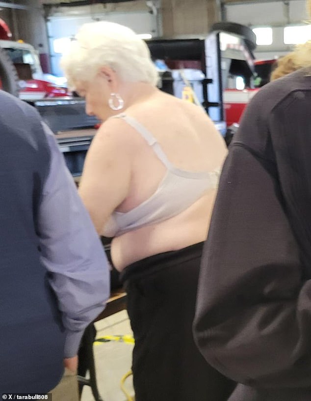 Some voters were forced to remove clothing that supported a candidate and cast their votes in underwear, like this woman