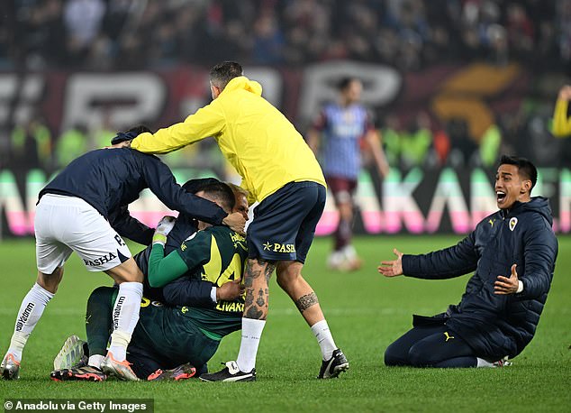 Mourinho charged forward to celebrate a goal in the 102nd minute in his side's 3-2 win over Trabzonspor