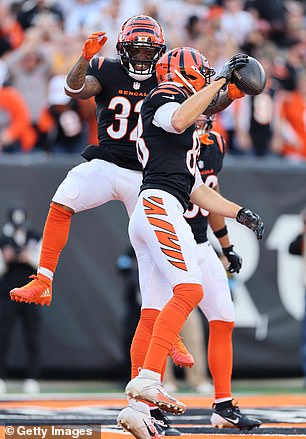 Trayveon Williams #32 and Mike Gesicki #88 of the Cincinnati Bengals celebrate after Gesicki's fourth quarter touchdown