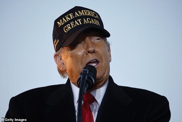 Another panelist pointed out that Trump is probably most concerned about North Carolina because he visits it so often (Trump is pictured at a rally on Sunday in Kinston, North Carolina)