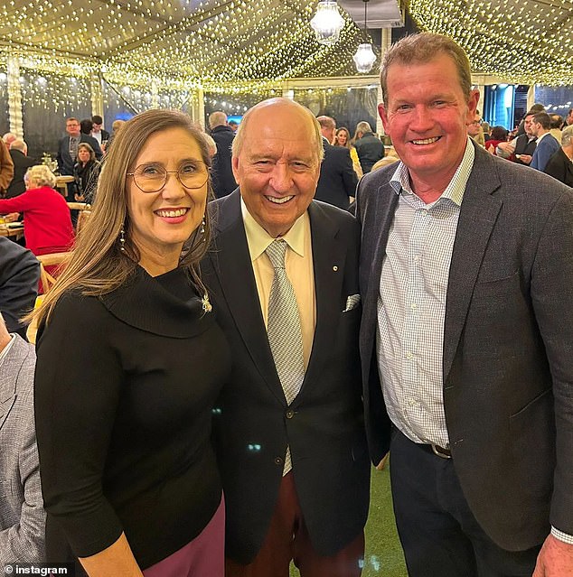 He posed with attendees, including Liberal National Party representatives Donna Kirkland and Glen Kelly, at a dinner celebrating Matt Canavan's 10th anniversary in the Senate.