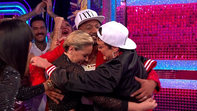 Amy, 34, burst into tears as she watched JB and her replacement Lauren achieve a near-perfect score for their routine