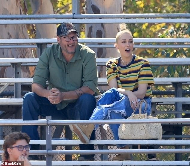 Blake and Stefani excitedly cheered on little Apollo from the sidelines