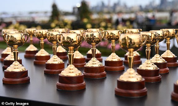 MELBOURNE, AUSTRALIA – NOVEMBER 02: Miniature Melbourne Cups are on display during the Melbourne Cup draw during the Penfolds Victoria Derby Day 2024 at Flemington Racecourse on November 2, 2024 in Melbourne, Australia. (Photo by Vince Caligiuri/Getty Images)