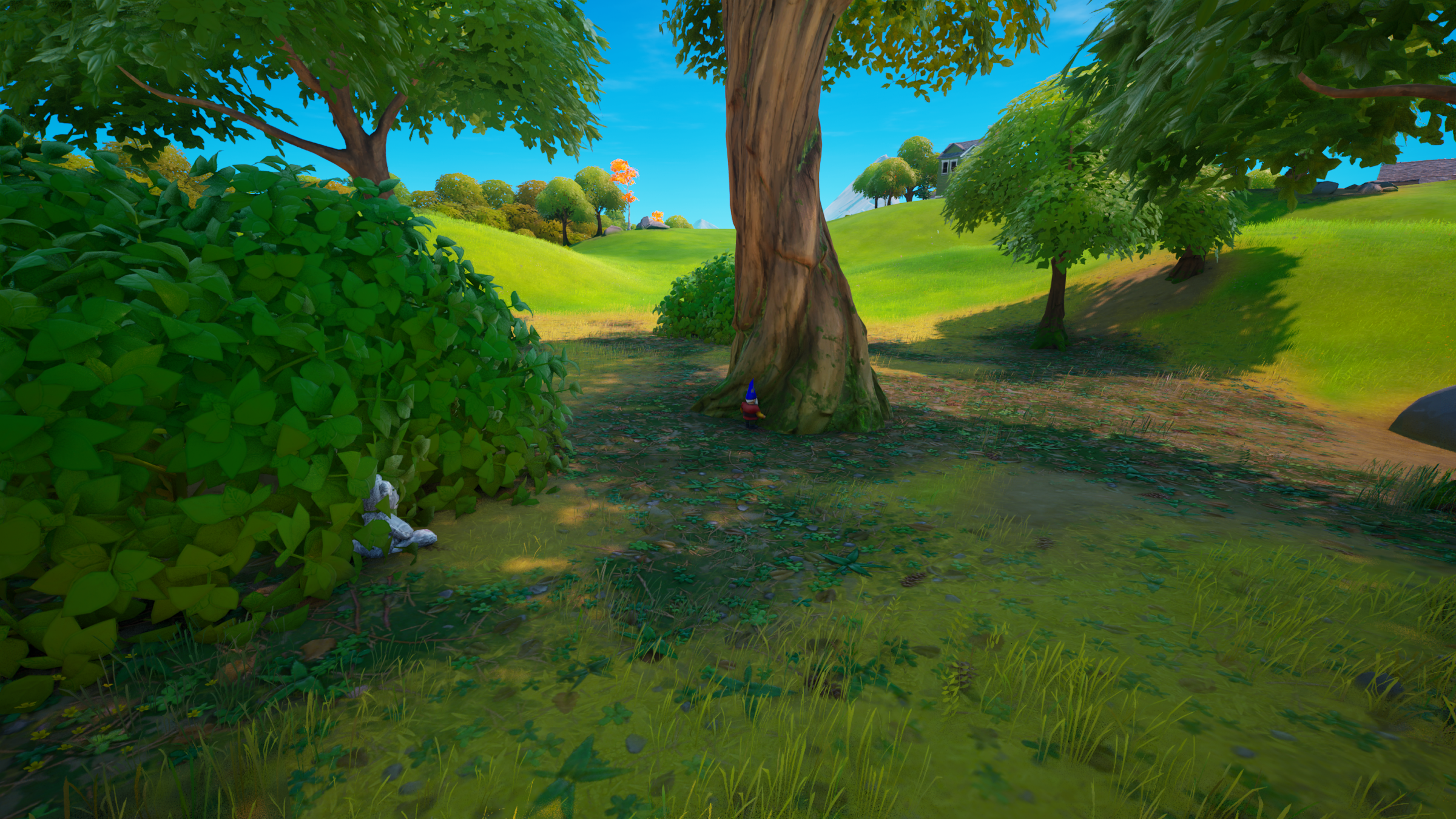 A gnome stands by a tree in Fortnite Remix