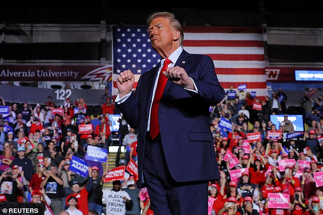 Former President Donald Trump dances on stage during a campaign rally Monday in Reading, Pennsylvania. Nevada is considered one of seven battleground states in this year's presidential election