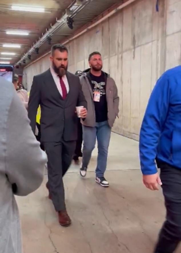 Jason Kelce arrived at Arrowhead Stadium on Monday night wearing a gray suit and red tie