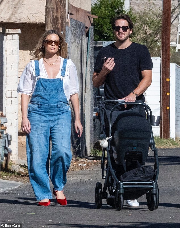 The Barbie star enjoyed a leisurely walk with her newborn son and husband Tom Ackerley, 34