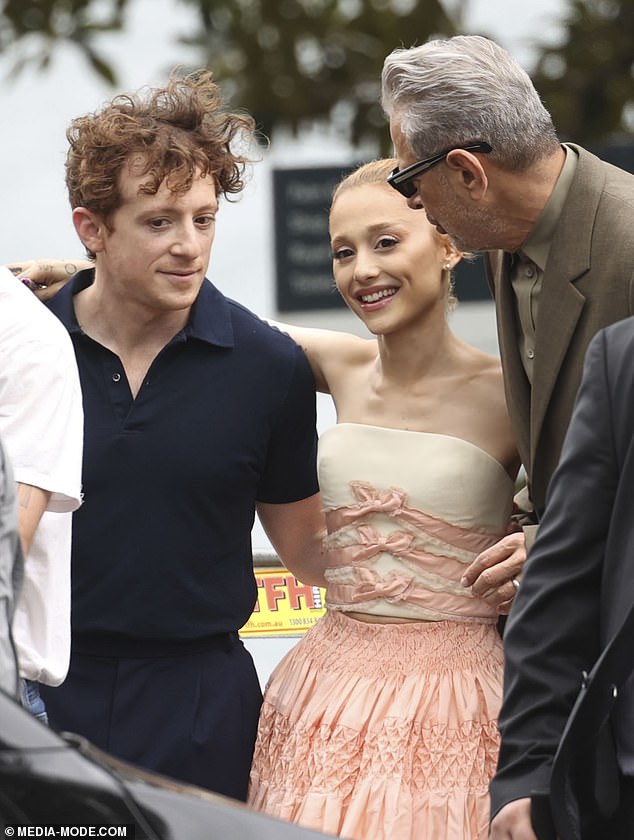 Her dark brown hair was pulled back in a bun and a light layer of nude makeup helped emphasize her natural beauty