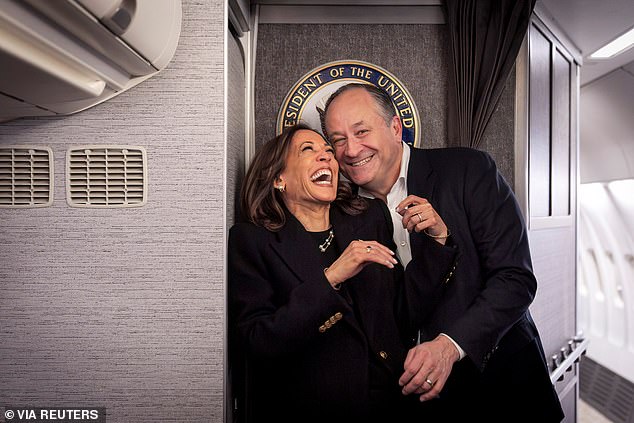 Democratic presidential candidate Vice President Kamala Harris, left, shares a laugh with Second Gentleman Doug Emhoff, after reuniting in Pittsburgh, Monday, November 4, 2024,