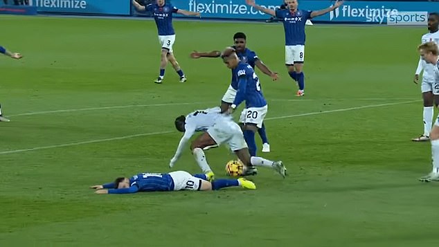 Leicester's Abdul Fatawu knocked out Ipswich striker Conor Chaplin in the penalty area