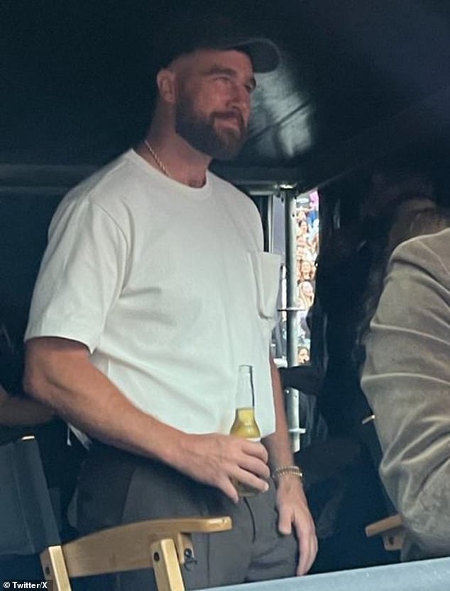 Travis surprised Taylor's mother Andrea and brother Austin when he joined them in the audience to support his love; pictured at a show in Dublin, Ireland, in June