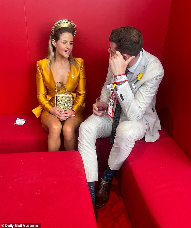 The famous couple appeared to be on fire in a luxury marquee during the Melbourne Cup at Flemington Race Course