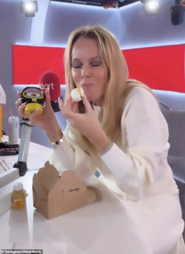 Amanda sent fans wild with her food hack on Tuesday when she shared a clip of herself pouring marmite on a boiled egg