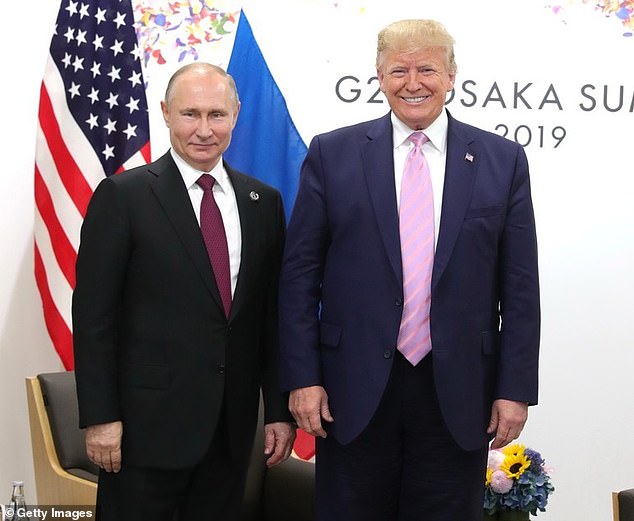 FILE IMAGE: U.S. President Donald Trump (R) meets with Russian President Vladimir Putin (L) on the first day of the G20 Summit in Osaka, Japan on June 28, 2019