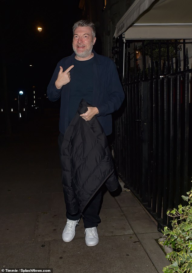 Charlie cut a casual figure in a navy blue sweatshirt and black jeans, complete with a padded jacket and white trainers