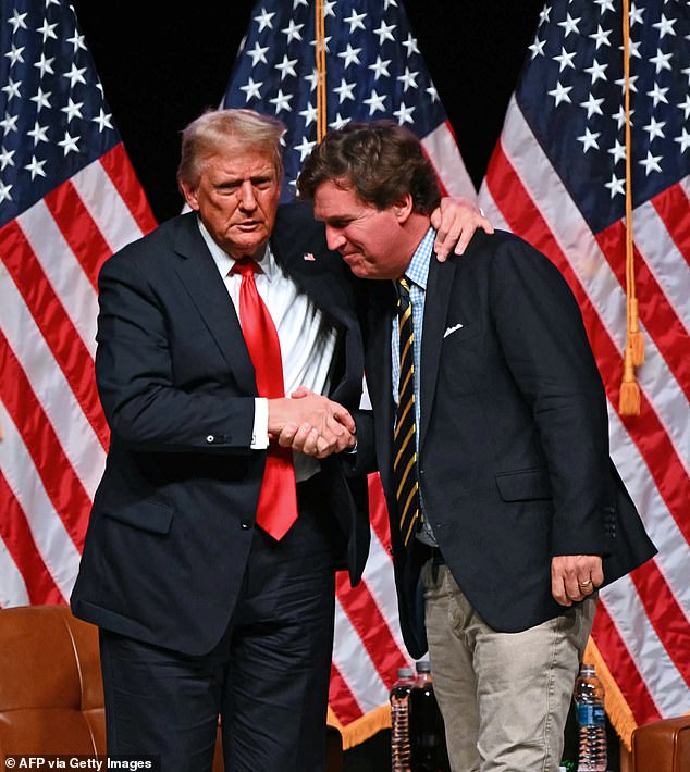 Carlson, a staunch supporter of Donald Trump (pictured with Carlson on Oct. 31) and confidante over the past year, praised as 