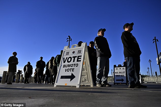 Voters line up to cast their ballots at Allegiant Stadium on November 5, 2024 in Las Vegas, Nevada. Americans cast their votes today in the presidential race between Republican candidate President Donald Trump and Democratic candidate Vice President Kamala Harris, as well as multiple state elections