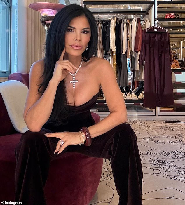 Here, Lauren shows off her Bezos diamond ring while posing in a closet