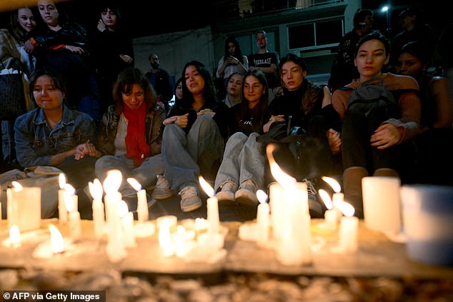 Liam Payne's fans lit candles next to the hotel where he died in Buenos Aires