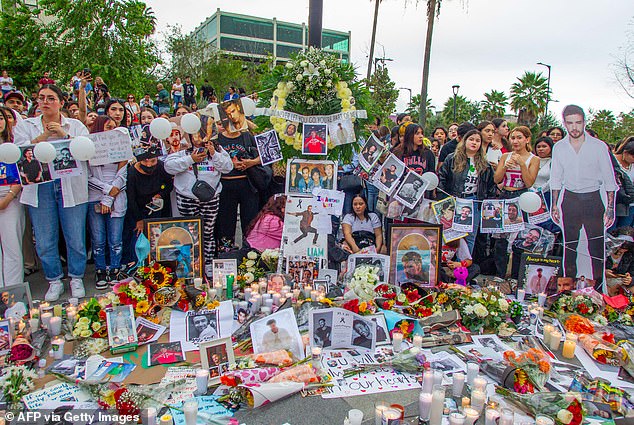 Liam Payne fans gather to pay their respects on the Monterrey Macroplaza esplanade on October 2