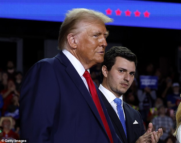 Trump, pictured in Grand Rapids, Michigan, held four rallies on Monday, the eve of the election. His meeting in Michigan started at 10:30 p.m