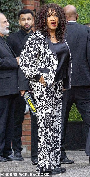 Actress Kym Whitley was later seen arriving at the memorial wearing a black and white patterned blazer and matching trousers.