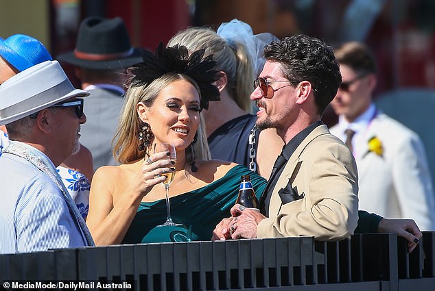 The trio were spotted drinking together for hours at Flemington Racecourse before the Melbourne Cup as things between them seemed anything but frosty