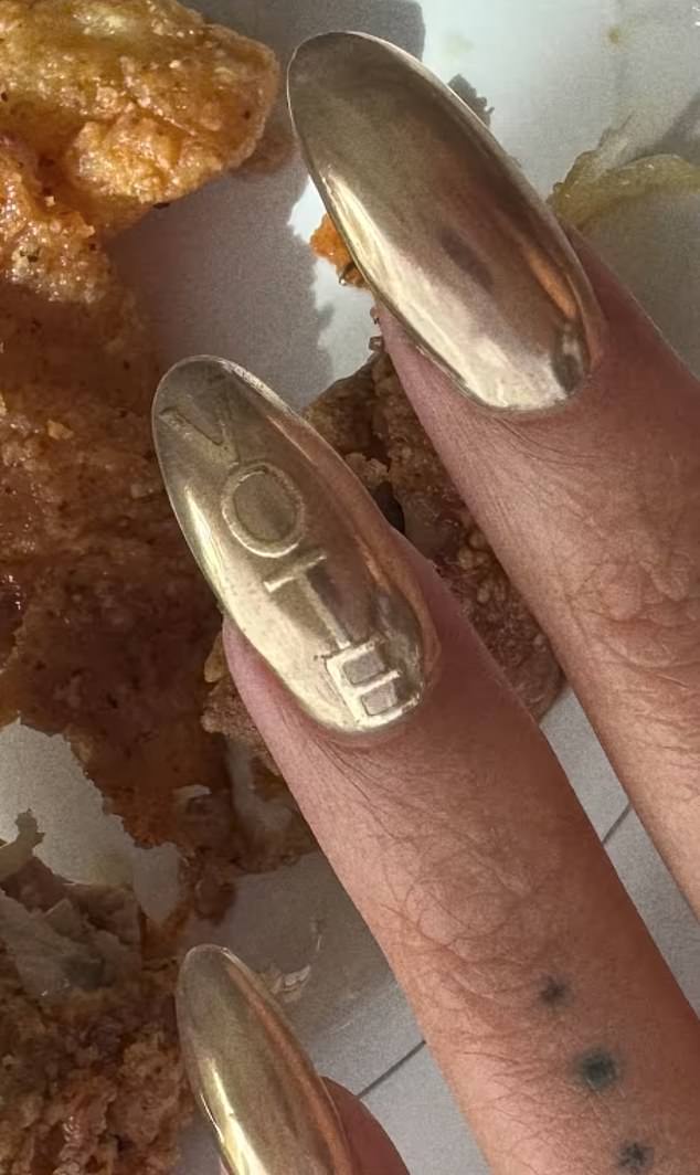 There was also a photo showing her gold nails, which said 