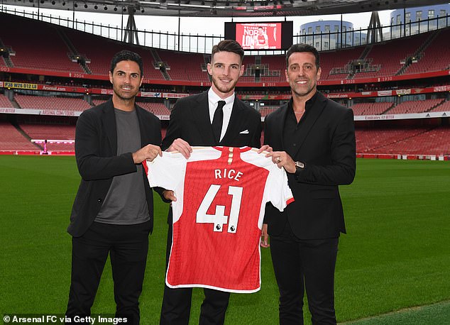 The Brazilian, pictured alongside Arteta and last summer's signing Declan Rice, has overseen an overhaul of Arsenal's squad that has seen them become Premier League title challengers