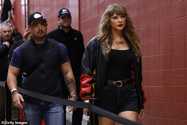 Swift walks into the stadium on Monday night to support her boyfriend Travis Kelce