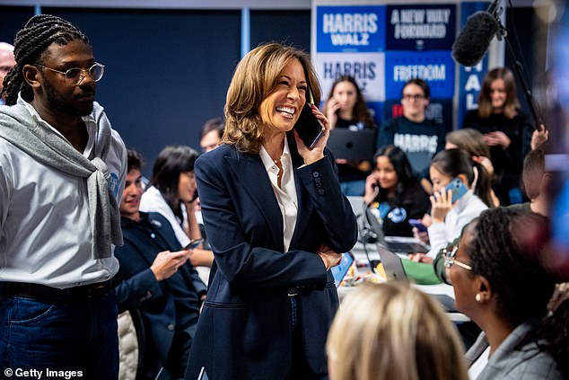 Kamala Harris stops by a phone bank event at the Democratic National Committee headquarters on Election Day in Washington, DC