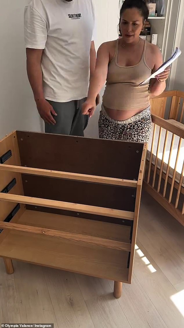 You can see Olympia and Thomas putting together furniture before the baby arrives