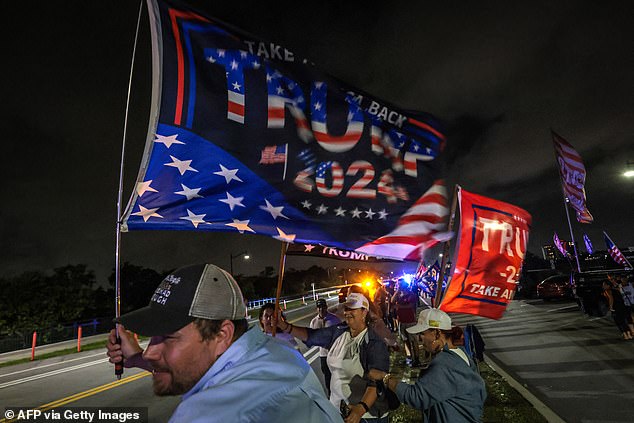 Supporters waved flags and set off fireworks outside Mar-a-Lago