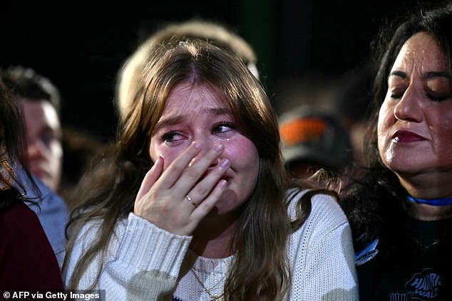 A Harris supporter is seen in tears during the election event at Howard University in Washington DC